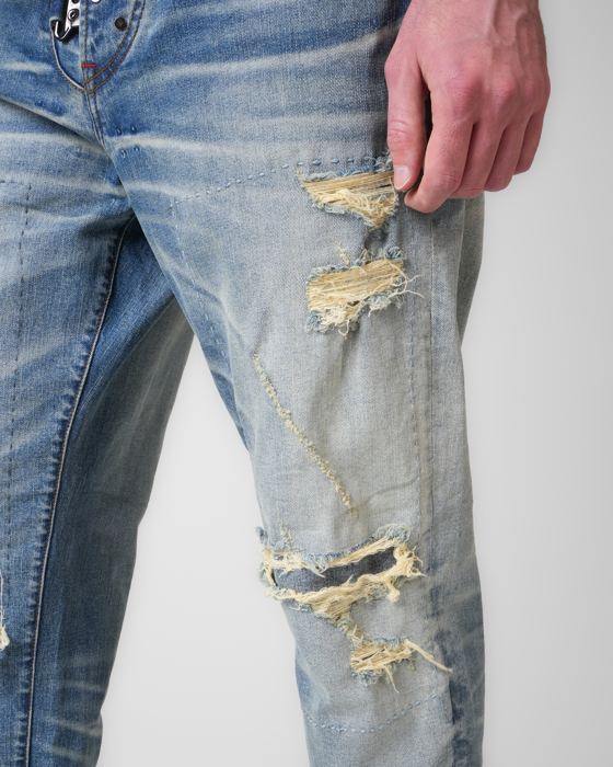 Ground-through knee on light-wash denim