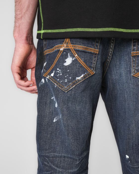 Arched back-pocket stitching on dark denim